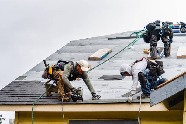 Professional Roofing technician working in Lynn, MA